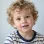 A little boy grinning