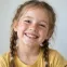 A young girl laughing